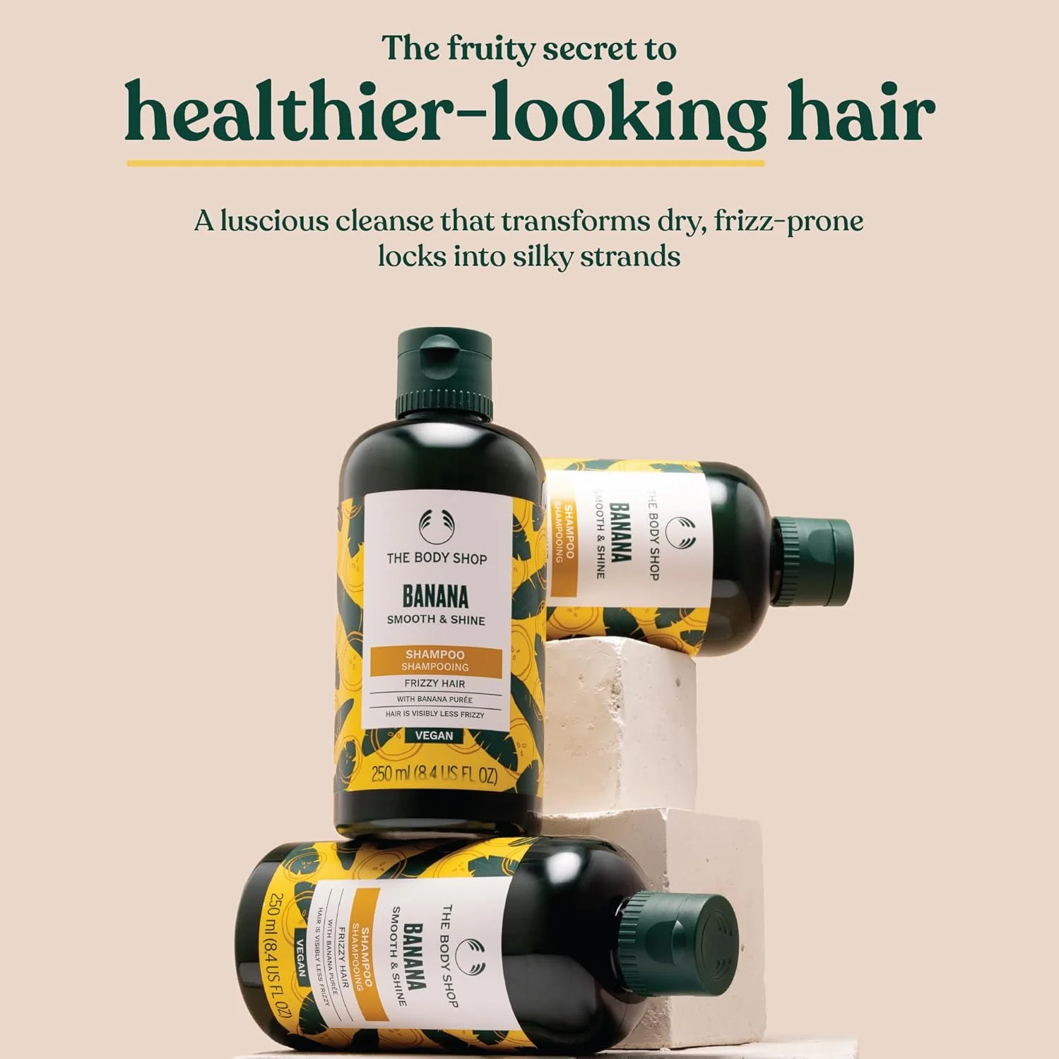 شامپو مغذی موی سر با رایحه موز بادی شاپ (250 میلی لیتر)، شامپو وگان برای موهای خشک حاوی موز ارگانیک، صاف کننده وز و تغذیه کننده از ریشه تا نوک، شامپو موز بادی شاپ برای داشتن موهایی سالم تر