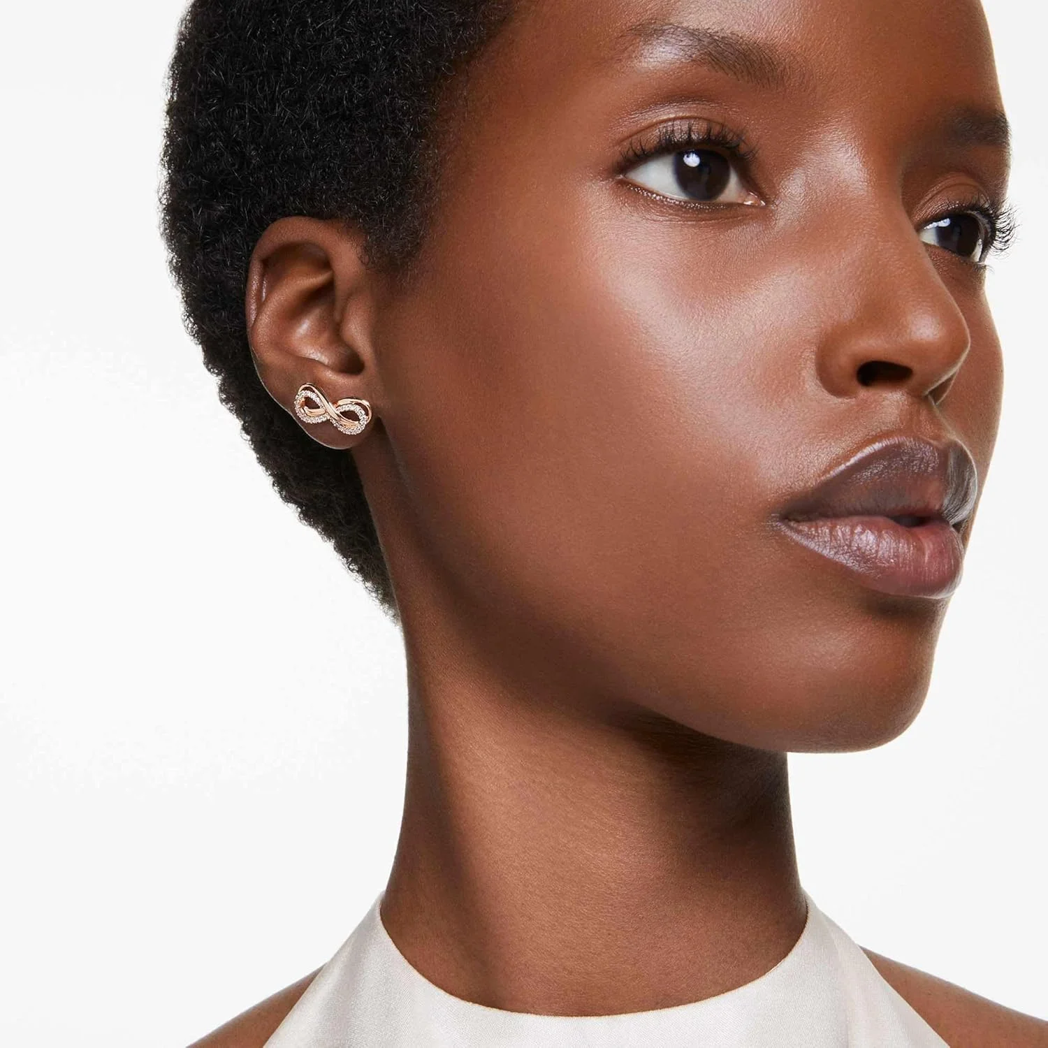 گوشواره های میخی سواروسکی هایپربولا، بی نهایت، سفید، با روکش طلایی رزگلد گوشواره های میخی سواروسکی هایپربولا، بی نهایت، سفید، با روکش طلایی رزگلد