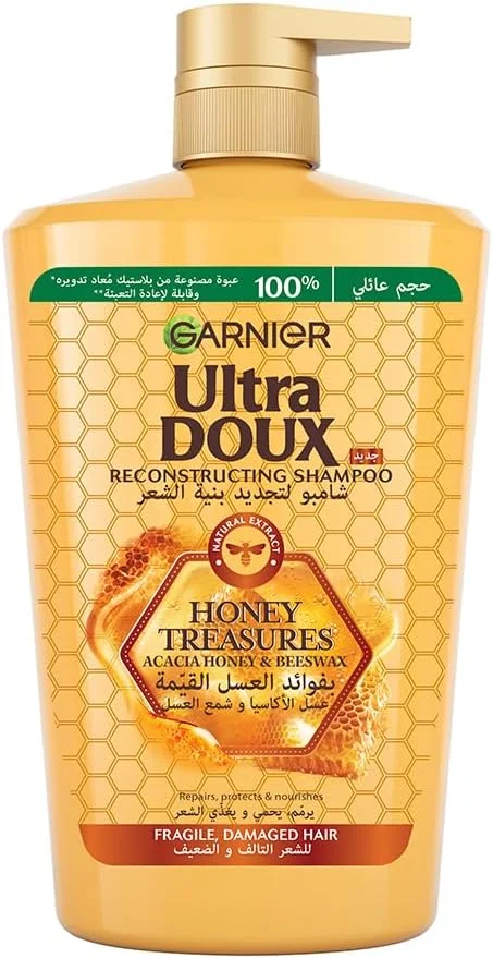 شامپو ترمیم کننده موهای شکننده و آسیب دیده Garnier Ultra Doux Honey Treasures - حجم 1000 میلی لیتر