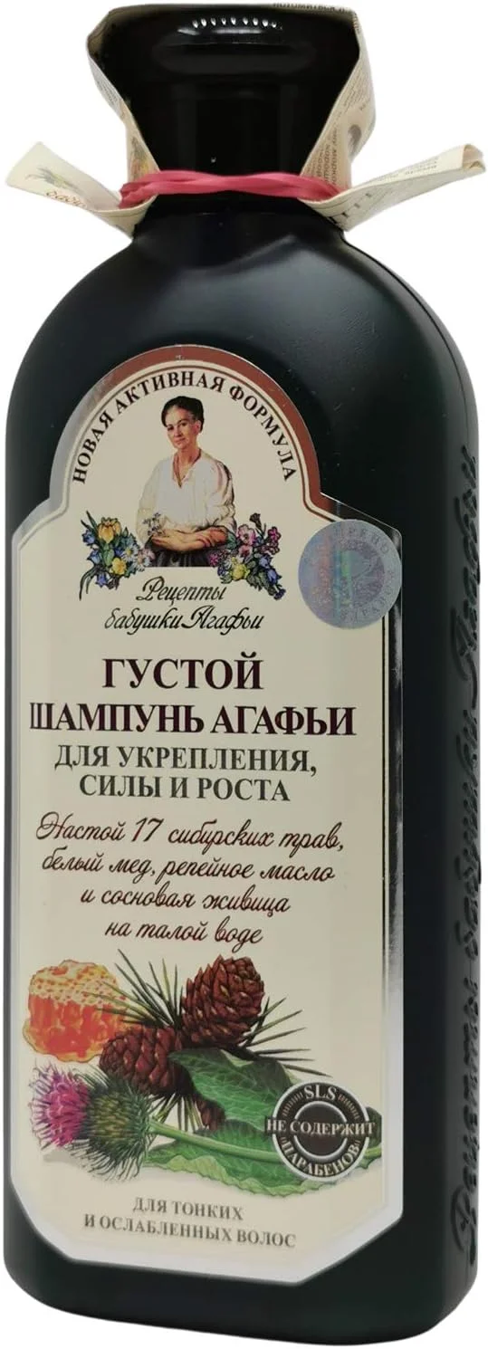 شامپو «ضخیم» آگافیا برای تقویت و افزایش رشد مو، حاوی رزین کاج ذوب شده در آب، مجموعه ای از 17 گیاه سیبری، همراه با عسل سفید و روغن باباآدم 350 میلی لیتر