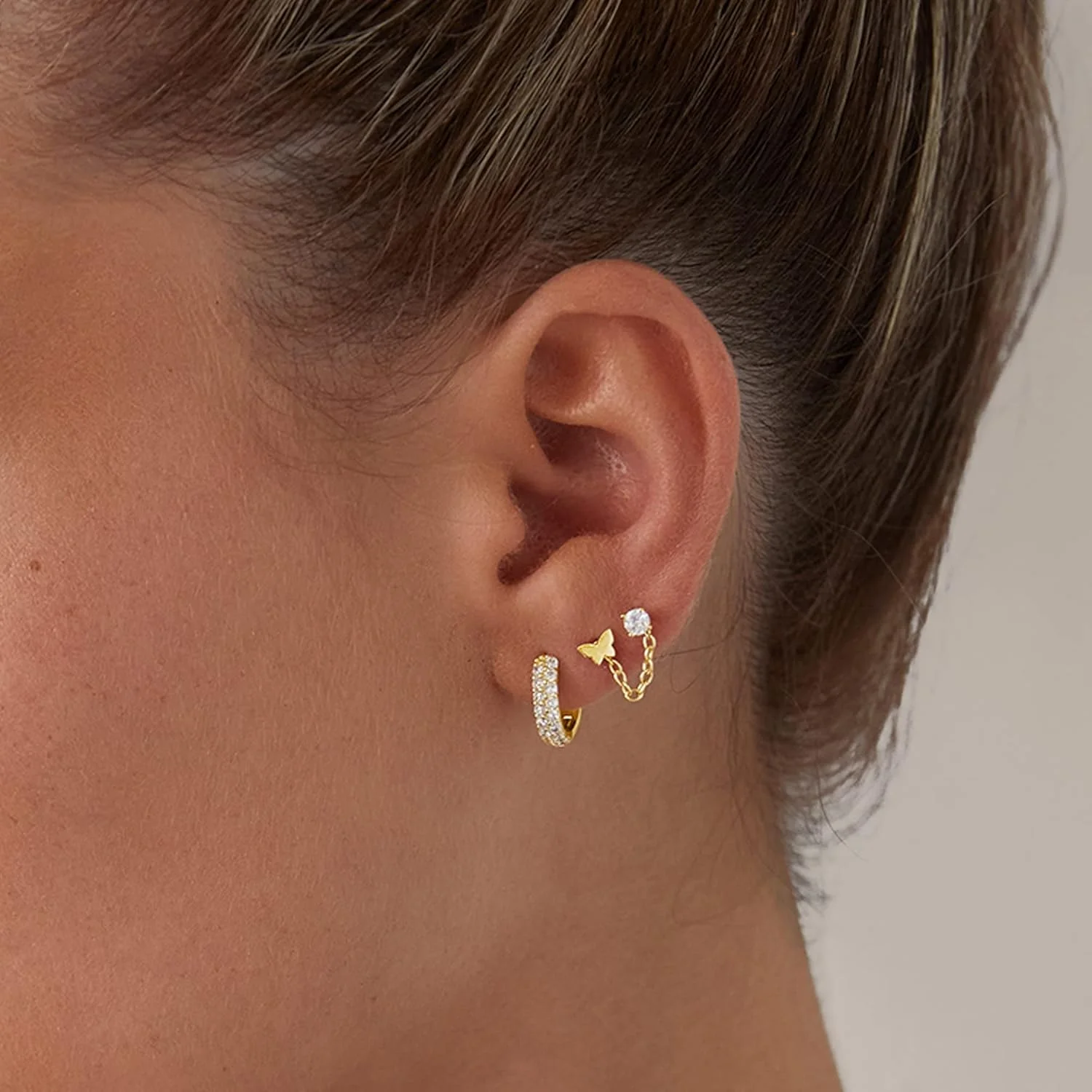 گوشواره های میخی پشت صاف زنانه پاوی با روکش طلای 14 عیار و پایه نقره استرلینگ 925 | پیرسینگ غضروف هلیکس | طرح های قلب، ماه، مار، صورتک خندان، پروانه، یین و یانگ و ستاره قطبی گوشواره های میخی پشت صاف زنانه پاوی با روکش طلای 14 عیار و پایه نقره استرلینگ 925 | پیرسینگ غضروف هلیکس | طرح های قلب، ماه، مار، صورتک خندان، پروانه، یین و یانگ و ستاره قطبی