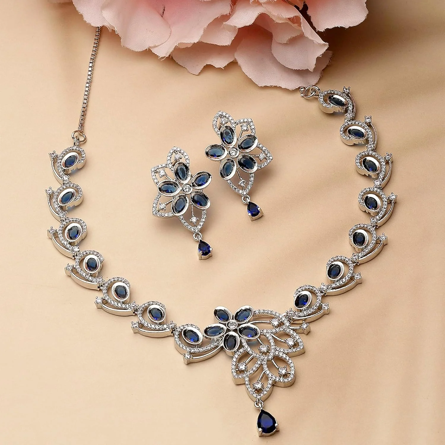 ست گردنبند و گوشواره زنانه طرح گل و بته جقه نگین دار با روکش رودیوم ZENEME (آبی نفتی) ست گردنبند و گوشواره زنانه طرح گل و بته جقه نگین دار با روکش رودیوم ZENEME (آبی نفتی)