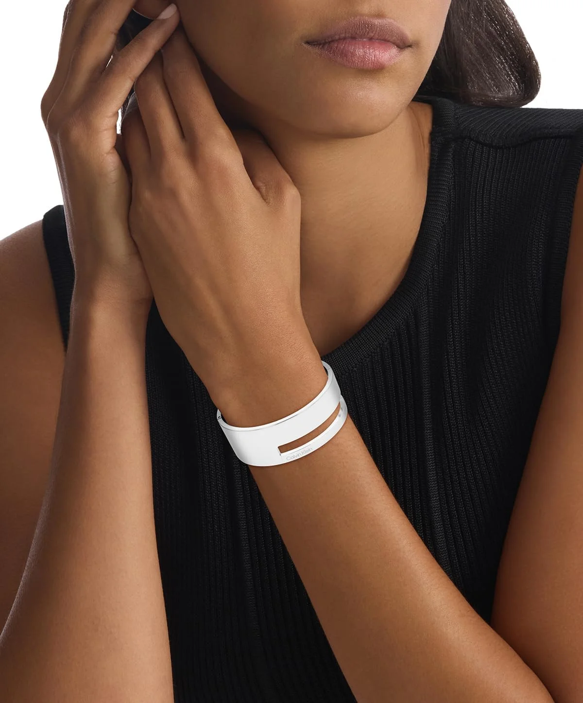 دستبند النگویی زنانه کالوین کلاین مجموعه GEOMETRIC ESSENTIALS از جنس استیل ضد زنگ و طلای زرد