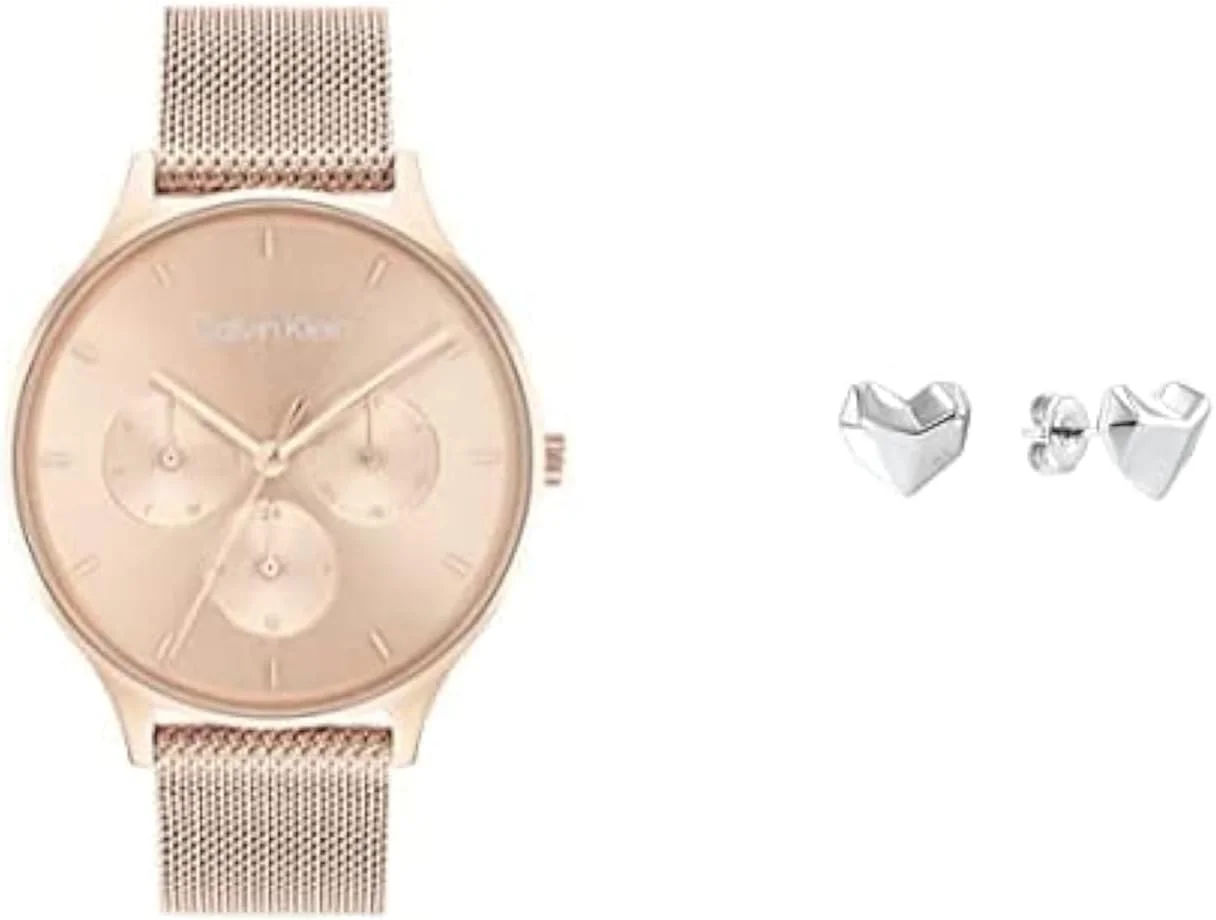 ساعت مچی زنانه کلوین کلاین Timeless Mesh Mf با صفحه طلایی میخکی روشن و بند استیل طلایی میخکی + گوشواره های میخی زنانه کلوین کلاین Faceted Heart