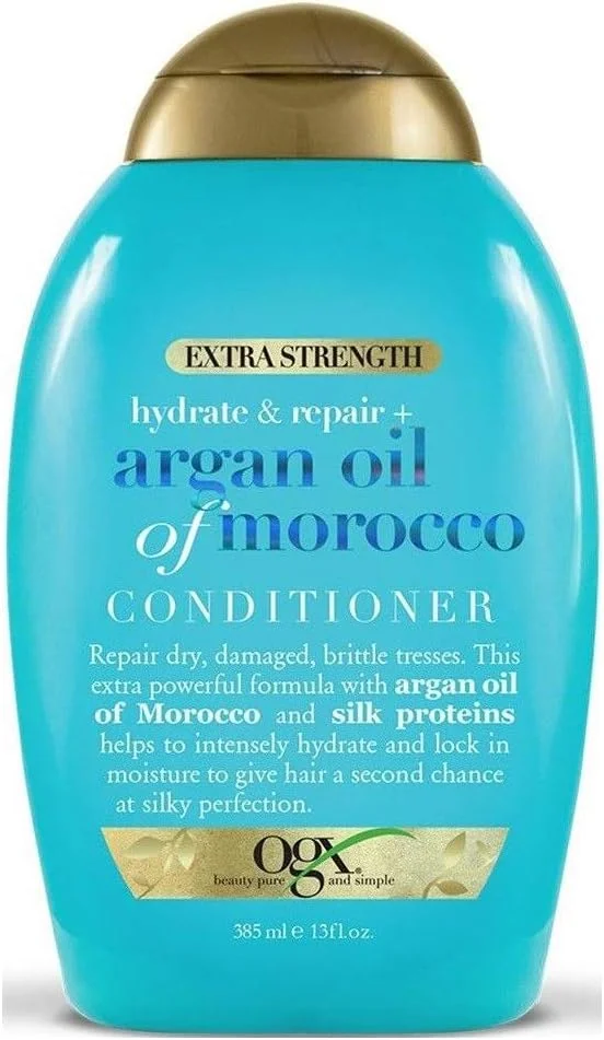 نرم کننده موی روغن آرگان OGX Hydrate & Repair با قدرت ترمیم کنندگی و آبرسانی فوق العاده