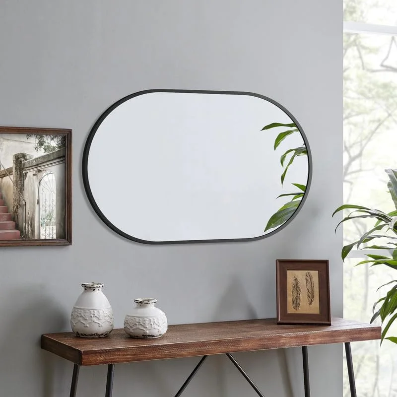 آینه دیواری بیضی شکل مشکی WOWINNE، ابعاد 80 × 50 سانتی متر، با قاب فلزی، آینه تزئینی برای حمام، اتاق نشیمن، اتاق خواب، سرویس بهداشتی مهمان، قابل نصب به صورت عمودی و افقی