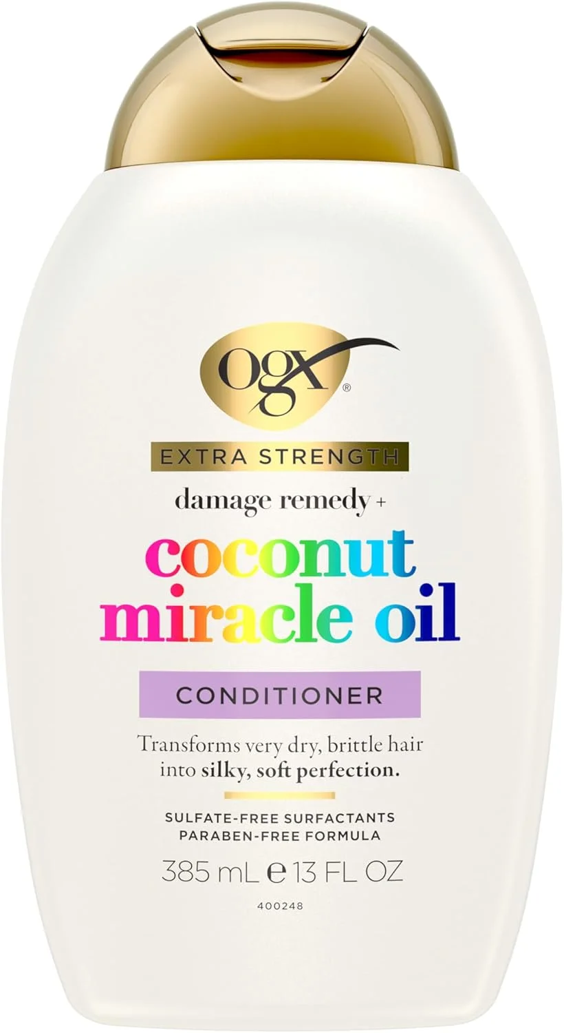 نرم کننده مو روغن نارگیل معجزه گر OGX Damage Remedy (375 میلی لیتر)، مراقبت مغذی از مو الهام گرفته از طبیعت با روغن نارگیل برای کمک به درخشش و ترمیم موهای بسیار خشک و آسیب دیده نرم کننده مو روغن نارگیل معجزه گر OGX Damage Remedy (375 میلی لیتر)، مراقبت مغذی از مو الهام گرفته از طبیعت با روغن نارگیل برای کمک به درخشش و ترمیم موهای بسیار خشک و آسیب دیده