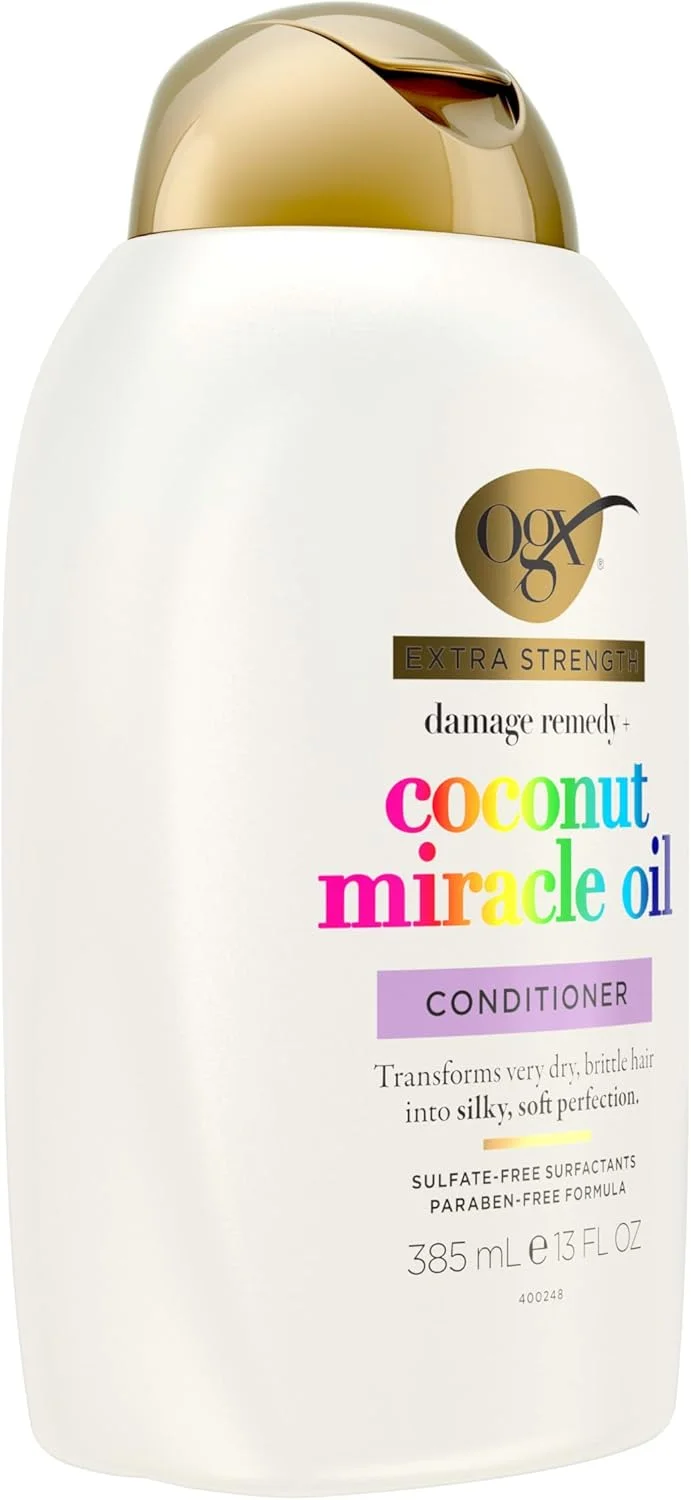 نرم کننده مو روغن نارگیل معجزه گر OGX Damage Remedy (375 میلی لیتر)، مراقبت مغذی از مو الهام گرفته از طبیعت با روغن نارگیل برای کمک به درخشش و ترمیم موهای بسیار خشک و آسیب دیده نرم کننده مو روغن نارگیل معجزه گر OGX Damage Remedy (375 میلی لیتر)، مراقبت مغذی از مو الهام گرفته از طبیعت با روغن نارگیل برای کمک به درخشش و ترمیم موهای بسیار خشک و آسیب دیده