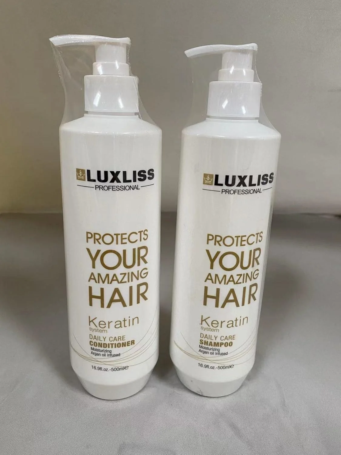 مجموعه شامپو و نرم کننده مراقبت روزانه کراتین لوکسلیس، 2 عدد (هر کدام 473 میلی لیتر)، مرطوب کننده، ضد وز، ترمیم کننده، برای موهای تحت درمان شیمیایی، حاوی روغن آرگان مجموعه شامپو و نرم کننده مراقبت روزانه کراتین لوکسلیس، 2 عدد (هر کدام 473 میلی لیتر)، مرطوب کننده، ضد وز، ترمیم کننده، برای موهای تحت درمان شیمیایی، حاوی روغن آرگان