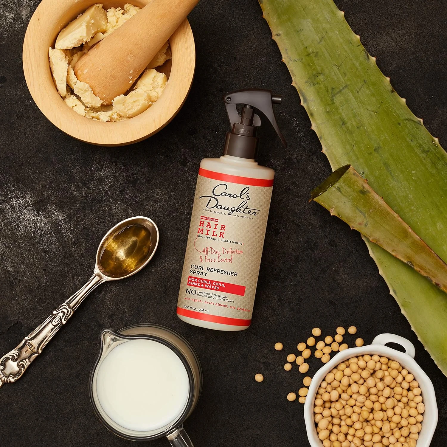 اسپری طراوت بخش شیر مو کارول داوتر، 296 میلی لیتر