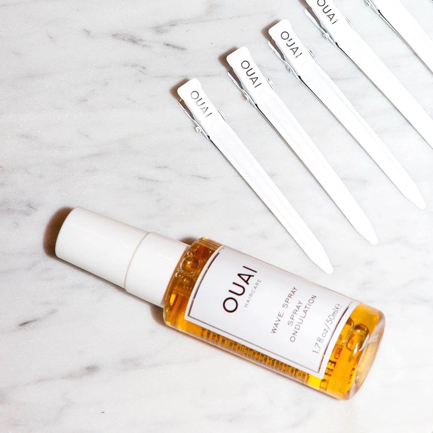 اسپری موج موی کوچک OUAI - روغن نارگیل و پروتئین برنج، بافت دهنده برای ایجاد موج های ساحلی، حجم و درخشندگی - بدون پارابن، ایمن برای موهای رنگ شده و کراتینه شده (50 میلی لیتر) اسپری موج موی کوچک OUAI - روغن نارگیل و پروتئین برنج، بافت دهنده برای ایجاد موج های ساحلی، حجم و درخشندگی - بدون پارابن، ایمن برای موهای رنگ شده و کراتینه شده (50 میلی لیتر)