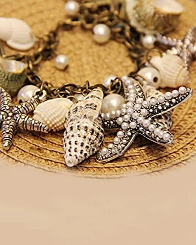 دستبند النگویی مرواریدی ستاره ای شیک و مد روز Shining Diva Fashion برای دختران (چند رنگ) (6276b) دستبند النگویی مرواریدی ستاره ای شیک و مد روز Shining Diva Fashion برای دختران (چند رنگ) (6276b)