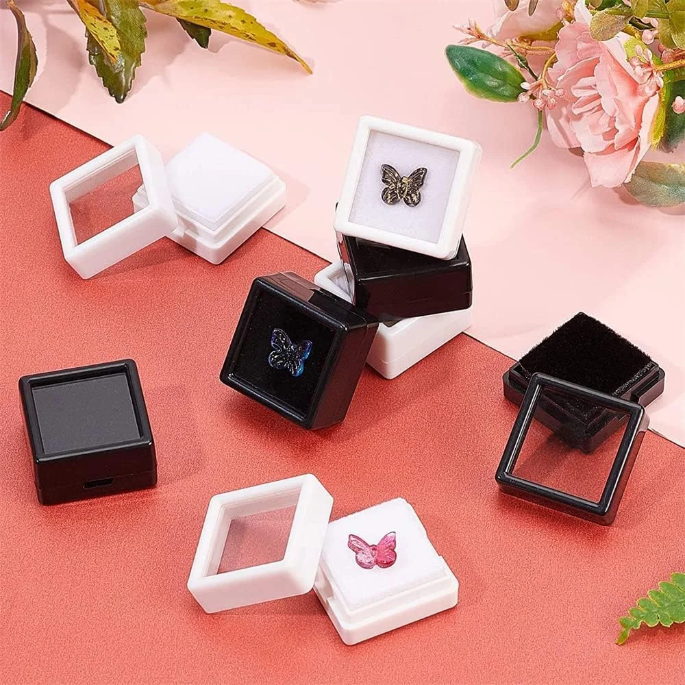 جعبه نمایش جواهرات خزنه، 12 عدد جعبه جواهرات اکریلیک مربع کوچک، محفظه با درب های شفاف و اسفنج داخلی برای نگهداری سنگ های قیمتی، سکه، بسته بندی جواهرات (مشکی، 2.95x2.95x1.65 سانتی متر) جعبه نمایش جواهرات خزنه، 12 عدد جعبه جواهرات اکریلیک مربع کوچک، محفظه با درب های شفاف و اسفنج داخلی برای نگهداری سنگ های قیمتی، سکه، بسته بندی جواهرات (مشکی، 2.95x2.95x1.65 سانتی متر)