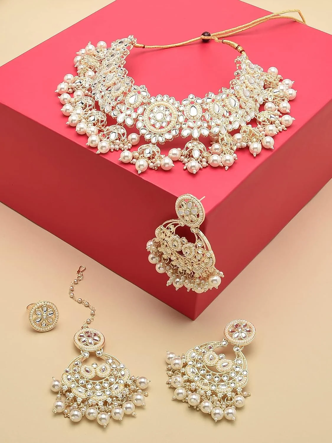 زیوری پرلز، ست گردنبند، گوشواره، مانگ تیکا و انگشتر عروس زنانه با طرح کندن و مروارید، رنگ طلایی - ZPFK12203 زیوری پرلز، ست گردنبند، گوشواره، مانگ تیکا و انگشتر عروس زنانه با طرح کندن و مروارید، رنگ طلایی - ZPFK12203