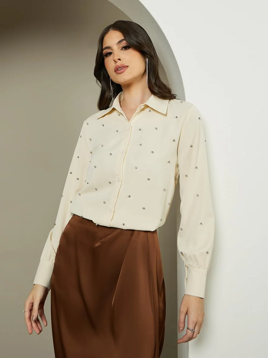 پیراهن زنانه استایلی یقه برگردان گشاد تزیین شده پیراهن زنانه استایلی یقه برگردان گشاد تزیین شده