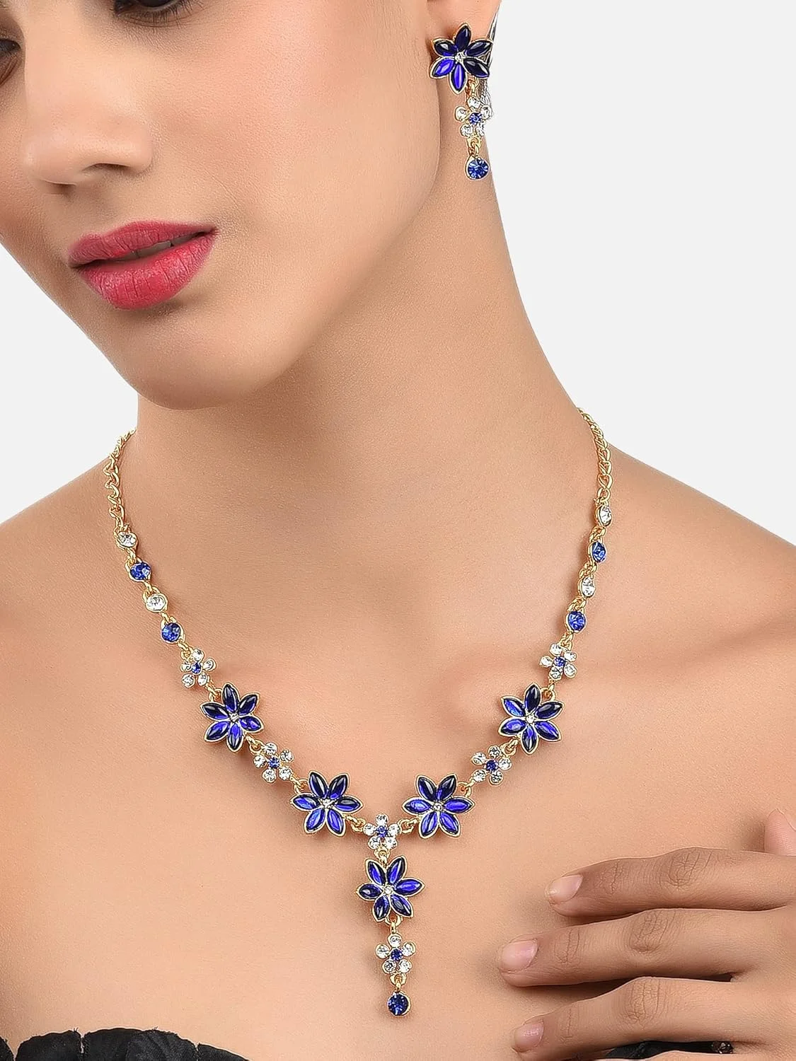 ست گردنبند زنانه نگین دار برگ آبی سلطنتی ZAVERI PEARLS با الماس اتریشی طرح گل (آبی) (ZPFK5185) ست گردنبند زنانه نگین دار برگ آبی سلطنتی ZAVERI PEARLS با الماس اتریشی طرح گل (آبی) (ZPFK5185)