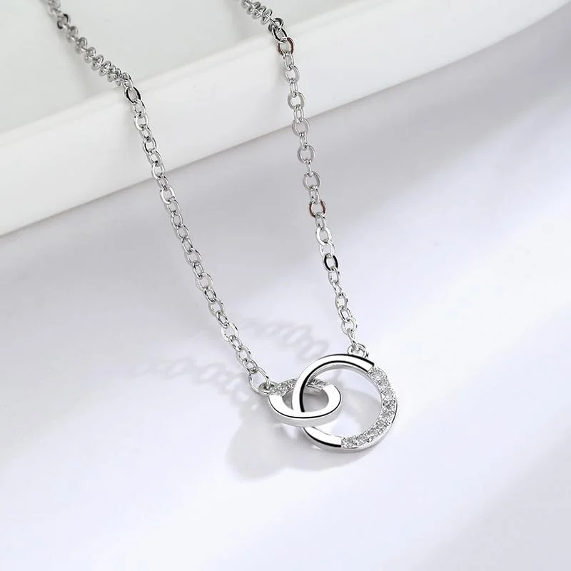 گردنبند آویز نقره استرلینگ 925 با طرح نوار موبیوس کریستالی و عناصر فشن، بسته بندی هدیه زنانه J.Rosée Fashion Jewelry JR-1175 گردنبند آویز نقره استرلینگ 925 با طرح نوار موبیوس کریستالی و عناصر فشن، بسته بندی هدیه زنانه J.Rosée Fashion Jewelry JR-1175