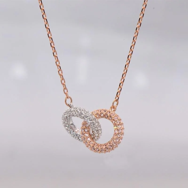 گردنبند آویز دو حلقه ای نقره ای و رزگلد با کریستال J.Rosée مدل JR-1244 گردنبند آویز دو حلقه ای نقره ای و رزگلد با کریستال J.Rosée مدل JR-1244