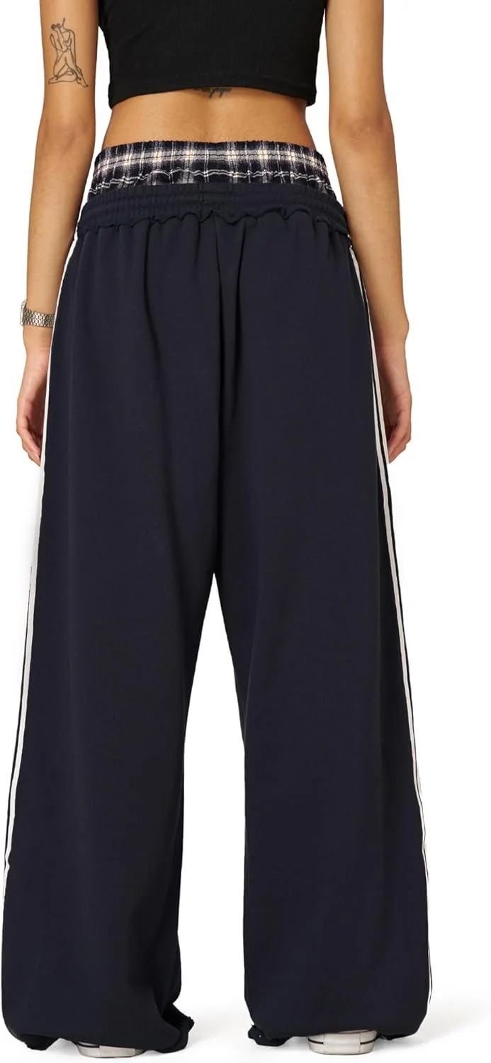 شلوار گرمکن پاچه گشاد زنانه الفریک ادن با طرح تکه دوزی چهارخانه، شلوار بلند و آزاد با جیب شلوار گرمکن پاچه گشاد زنانه الفریک ادن با طرح تکه دوزی چهارخانه، شلوار بلند و آزاد با جیب