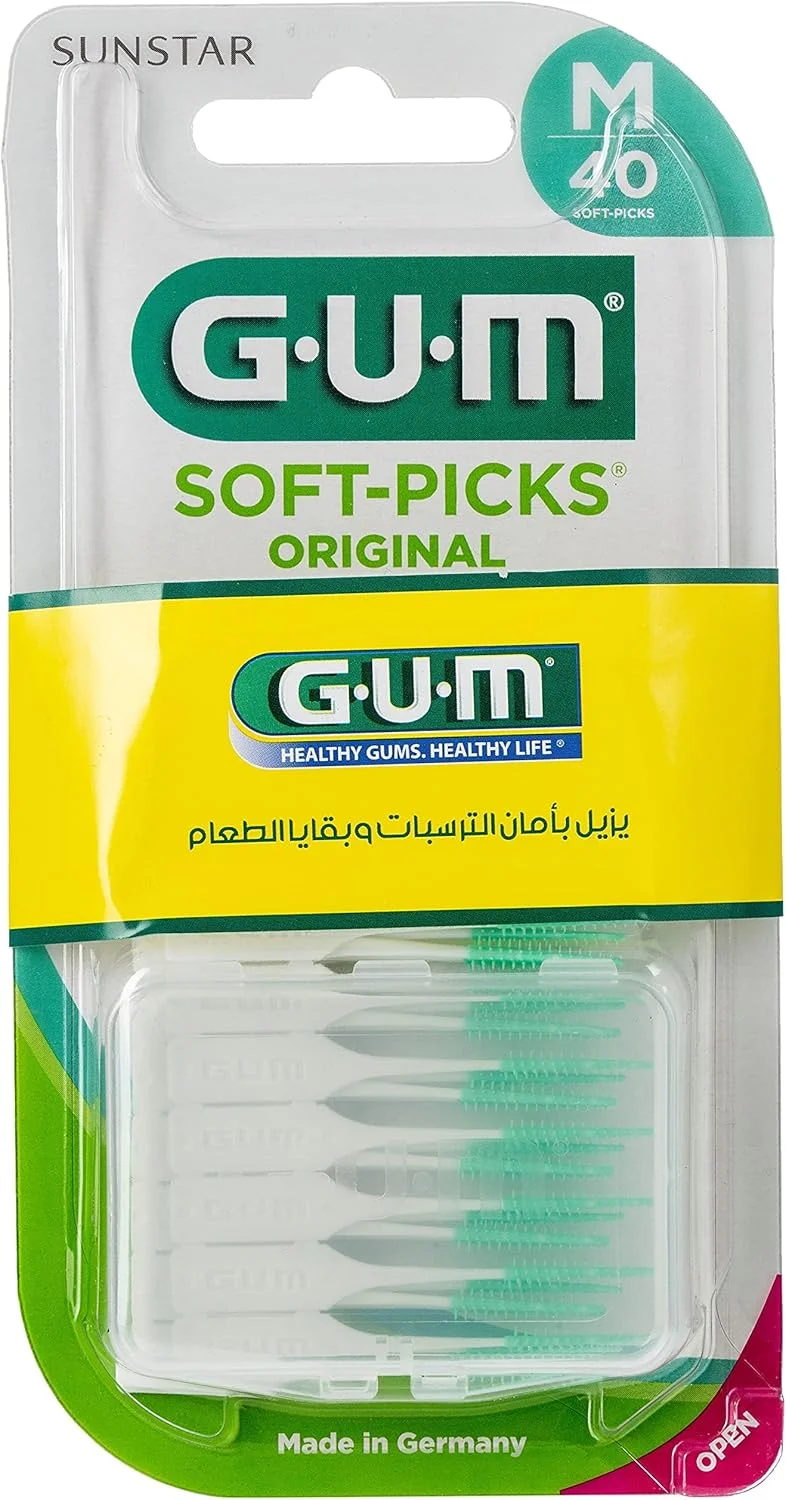 مسواک بین دندانی نرم Gum Soft Picks Original - دارای برس های لاستیکی نرم و منعطف - حاوی فلوراید - به طور ایمن پلاک و ذرات غذا را از بین می برد - لثه ها را تحریک می کند - با التهاب لثه مبارزه می کند - دارای جعبه مسافرتی مناسب - 40 عدد