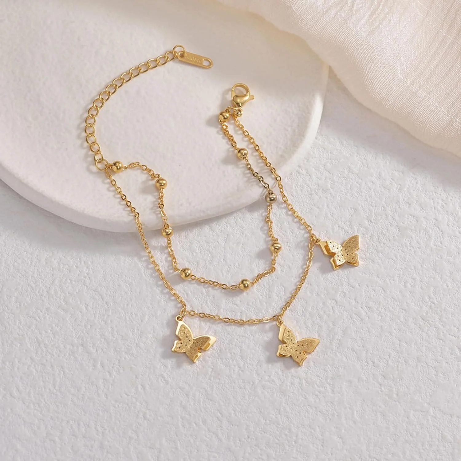 دستبند پروانه تزویق زنانه، دستبندهای طلایی زنانه مد روز، دستبند زنجیری ظریف قابل تنظیم استیل ضد زنگ، جواهرات مچ دست و پابند دستبند پروانه تزویق زنانه، دستبندهای طلایی زنانه مد روز، دستبند زنجیری ظریف قابل تنظیم استیل ضد زنگ، جواهرات مچ دست و پابند