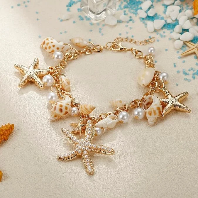 دستبند صدف و ستاره دریایی تزویق، جواهرات طرح پری دریایی، جواهرات ساحلی (طلایی) دستبند صدف و ستاره دریایی تزویق، جواهرات طرح پری دریایی، جواهرات ساحلی (طلایی)