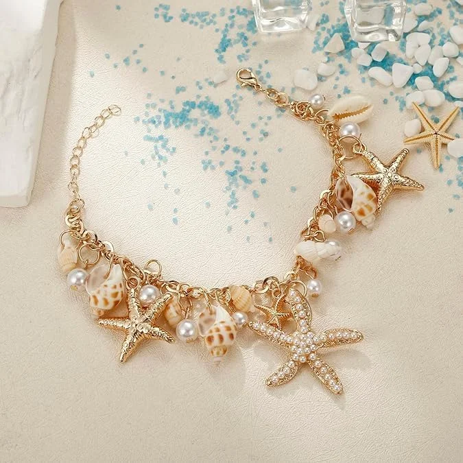 دستبند صدف و ستاره دریایی تزویق، جواهرات طرح پری دریایی، جواهرات ساحلی (طلایی) دستبند صدف و ستاره دریایی تزویق، جواهرات طرح پری دریایی، جواهرات ساحلی (طلایی)
