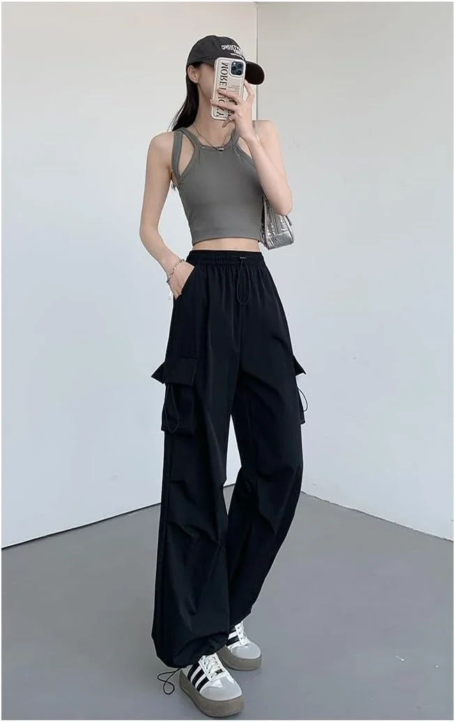 شلوار کارگو زنانه، بند دار، کمر کشی، مدل پارچه ای، گشاد و پاچه پهن، دارای جیب