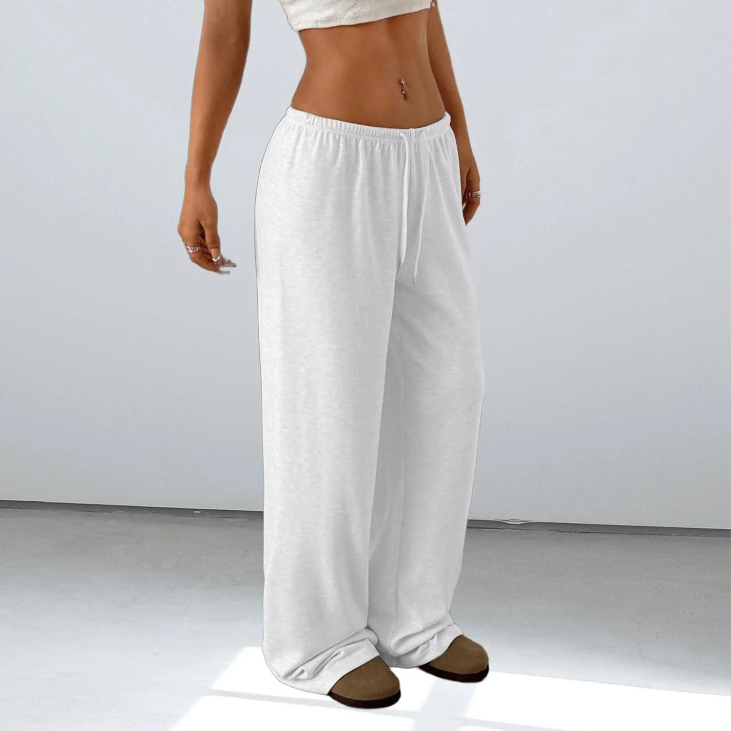 شلوار جاگر زنانه دیجانزا با فاق کوتاه، مدل Y2K، راسته و پاچه گشاد، دارای بند و جیب