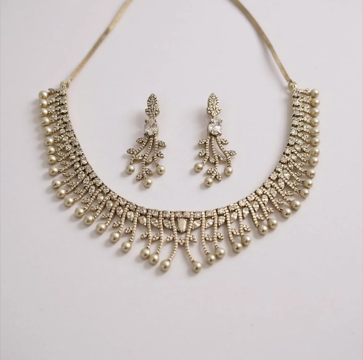 ست گردنبند شیک و نگین دار طرح الماس آمریکایی مدل 914259-NS با روکش رودیوم برای عروسی و مجالس، مناسب خانم ها و دختران - نقره ای ست گردنبند شیک و نگین دار طرح الماس آمریکایی مدل 914259-NS با روکش رودیوم برای عروسی و مجالس، مناسب خانم ها و دختران - نقره ای