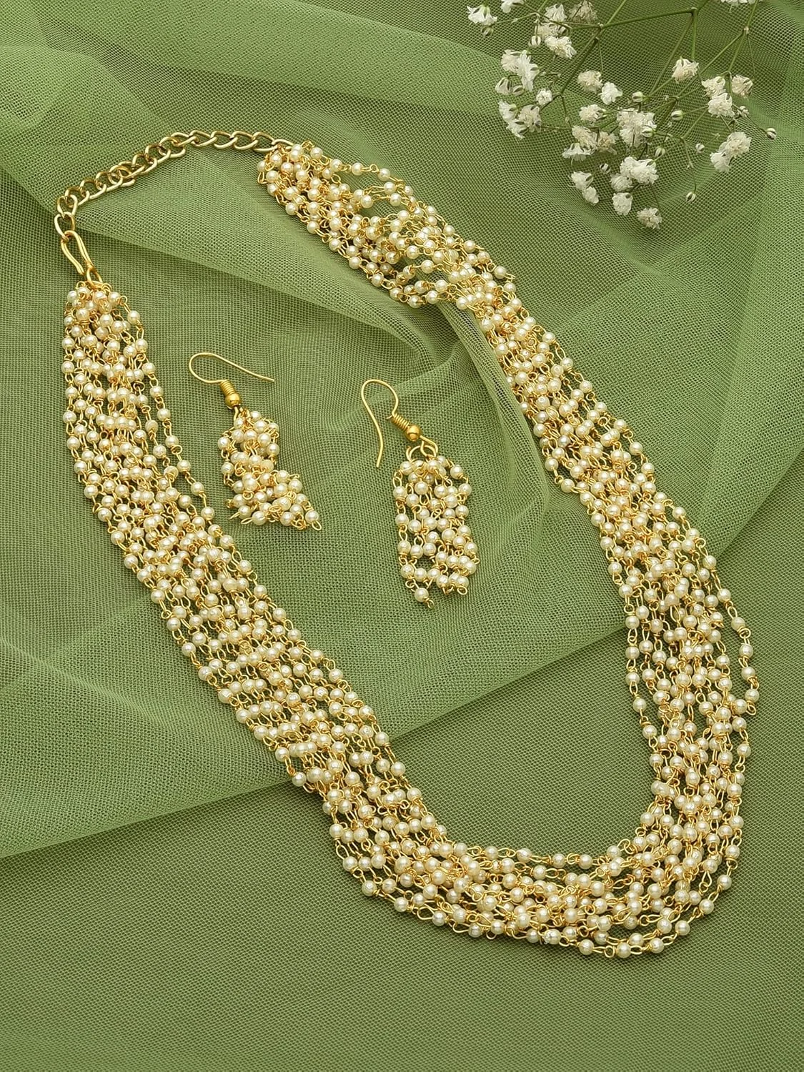 زیوری پرلز، ست گردنبند و گوشواره زنانه با مروارید چند رشته ای و طرح طلایی - ZPFK12744 زیوری پرلز، ست گردنبند و گوشواره زنانه با مروارید چند رشته ای و طرح طلایی - ZPFK12744