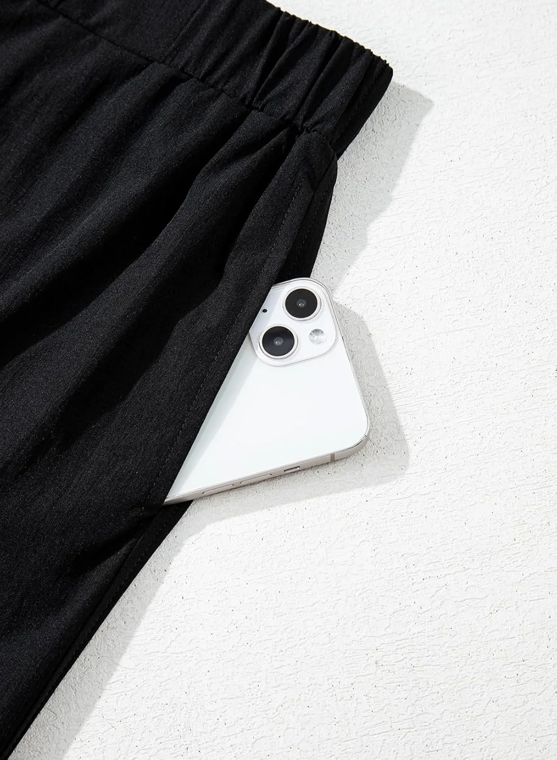 شلوار زنانه پاییزه کشی با فاق بلند، پاچه گشاد، قد کوتاه و چاکدار به همراه جیب شلوار زنانه پاییزه کشی با فاق بلند، پاچه گشاد، قد کوتاه و چاکدار به همراه جیب