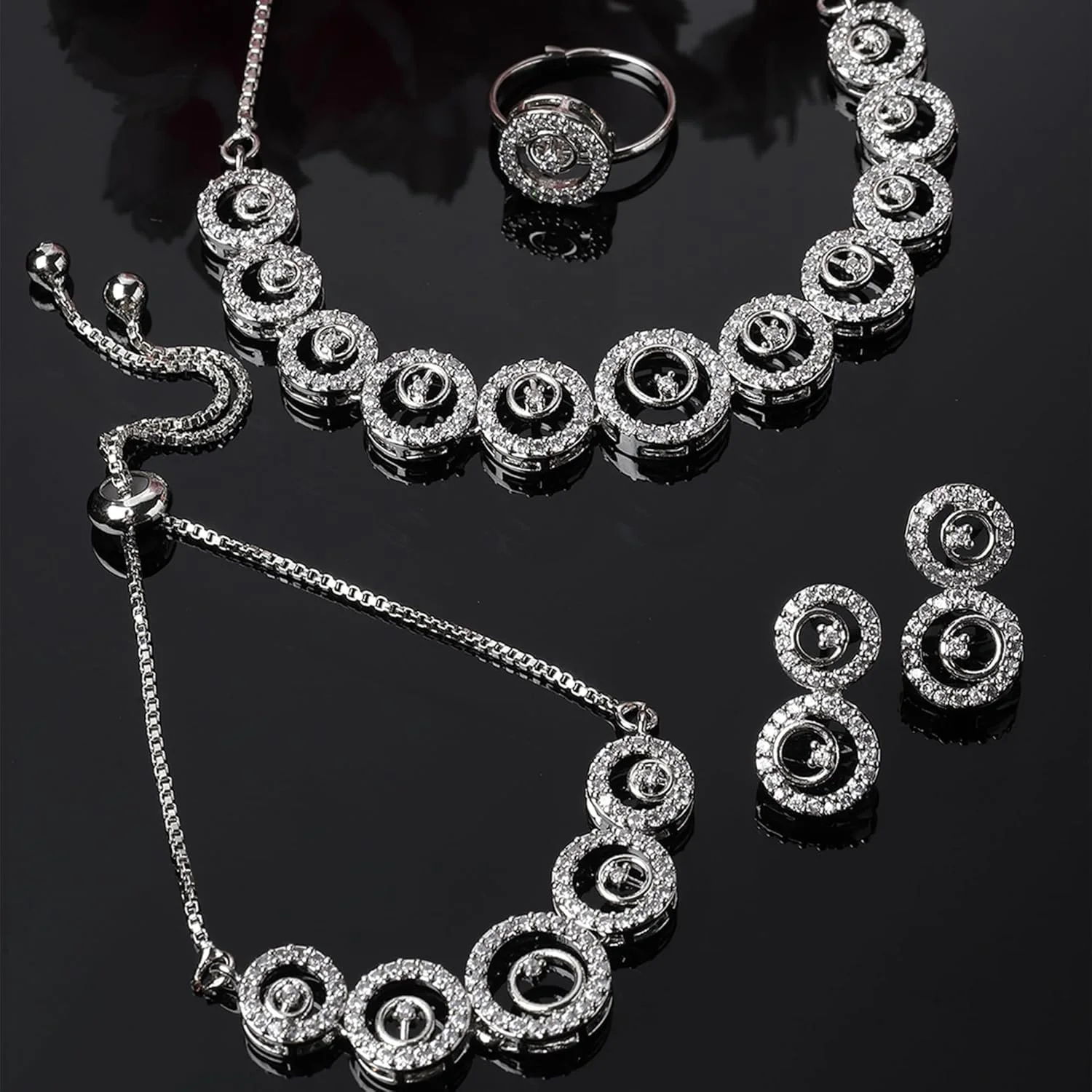 ست گردنبند چوکر، انگشتر، دستبند و گوشواره زنانه نگین دار ZENEME با روکش طلای نگین زیرکونیا، بسته 4 عددی (رادیوم) ست گردنبند چوکر، انگشتر، دستبند و گوشواره زنانه نگین دار ZENEME با روکش طلای نگین زیرکونیا، بسته 4 عددی (رادیوم)