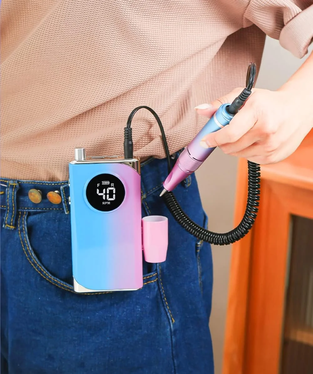 دستگاه سوهان برقی ناخن حرفه ای قابل حمل KASTWAVE با سرعت 40000 دور در دقیقه، سوهان برقی شارژی برای پولیش و برداشتن ژل اکریلیک، سوهان برقی بی سیم با کیت سر سوهان برای استفاده در سالن و منزل دستگاه سوهان برقی ناخن حرفه ای قابل حمل KASTWAVE با سرعت 40000 دور در دقیقه، سوهان برقی شارژی برای پولیش و برداشتن ژل اکریلیک، سوهان برقی بی سیم با کیت سر سوهان برای استفاده در سالن و منزل