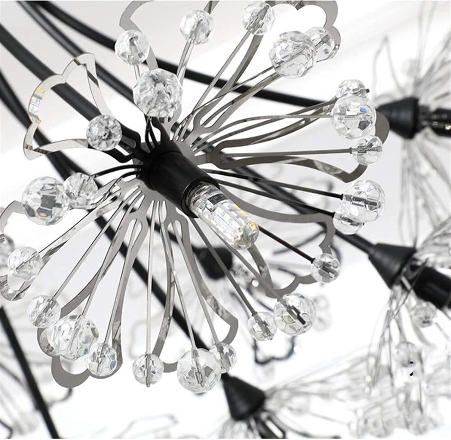 لوستر مدرن و مینیمال، خلاقانه و خاص، جنس کریستال و آهن فرفورژه، ابعاد ۴۸cm*۵۵cm، مناسب اتاق نشیمن، اتاق خواب، غذاخوری، مطالعه، راهرو، ویلا و ایوان با نور گرم لوستر مدرن و مینیمال، خلاقانه و خاص، جنس کریستال و آهن فرفورژه، ابعاد ۴۸cm*۵۵cm، مناسب اتاق نشیمن، اتاق خواب، غذاخوری، مطالعه، راهرو، ویلا و ایوان با نور گرم