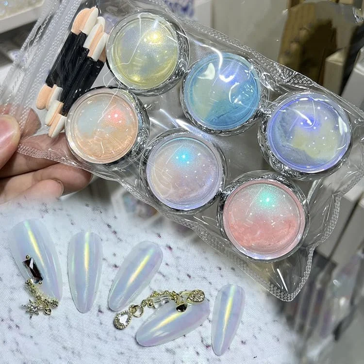 پودر آینه ای ناخن با 6 رنگ مختلف، پودر شفق قطبی، پودر جادویی، پودر صدف پری دریایی، تزئین ناخن با جلوه آینه ای، به همراه 4 عدد اسفنج دو طرفه رایگان