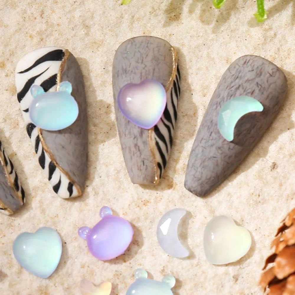 20 عدد تزیینات ناخن طرح قلب، ماه، پروانه، ستاره پنج پر و خرس بنفش