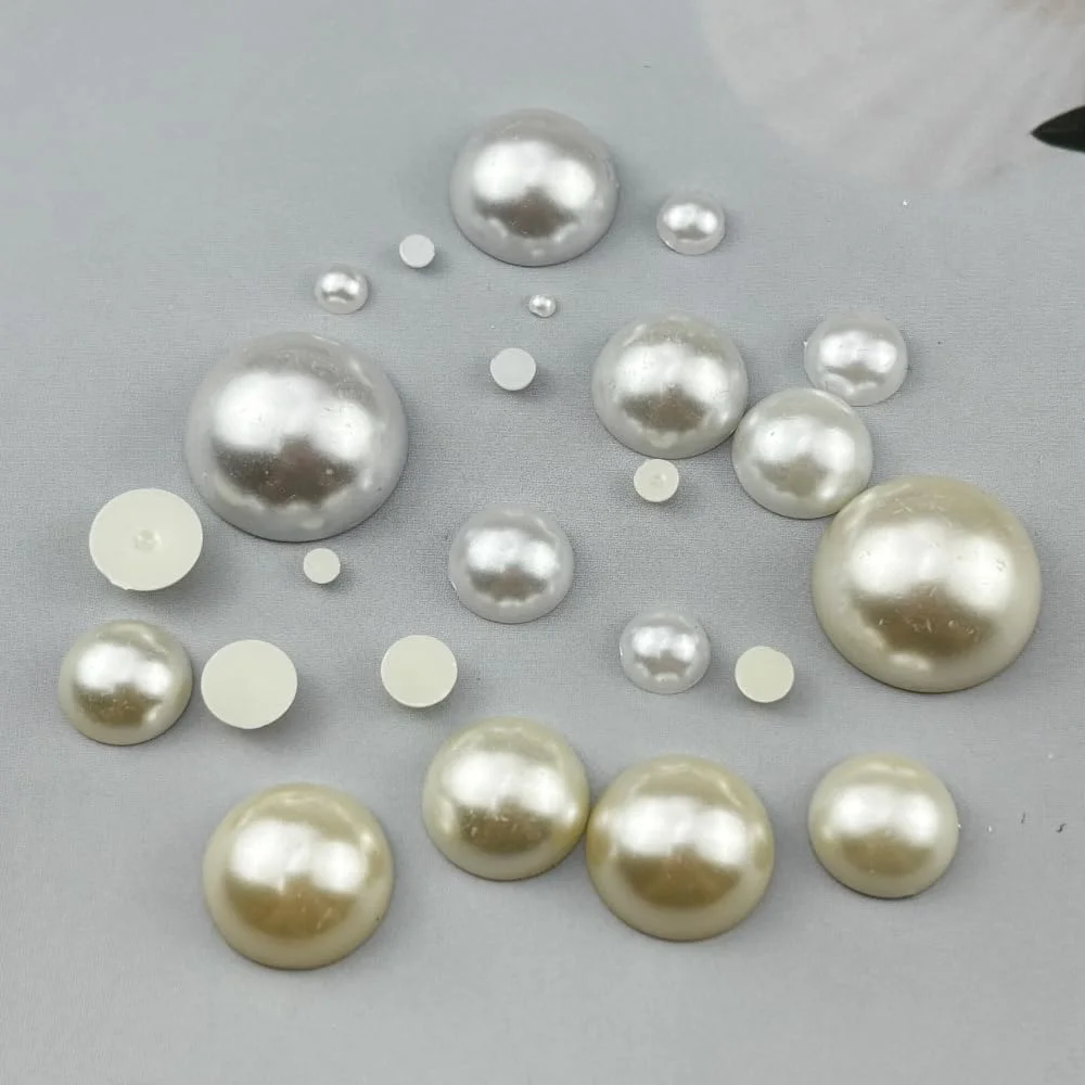 ۱۵۰ عدد مروارید نیمه ۱۶ میلی‌متری تخت برای کارهای دستی، مناسب ساخت جواهرات، طراحی ناخن، اسکرپ بوک، تزئین لباس عروسی (سفید)