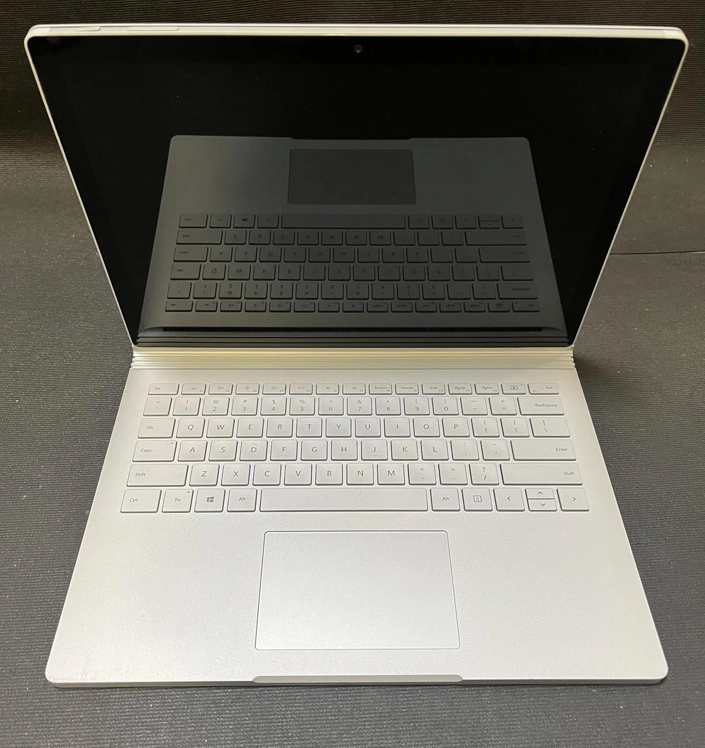 لپ تاپ تبدیل شونده مایکروسافت Surface Book 3، پردازنده چهارهسته ای نسل دهم Intel Core i7-1065G7 1.3 گیگاهرتز، 16 گیگابایت رم، 256 گیگابایت SSD، صفحه نمایش لمسی 15.5 اینچی، GeForce GTX 1660 Ti 6GB، صفحه کلید انگلیسی، ویندوز 10 پرو، نقره ای لپ تاپ تبدیل شونده مایکروسافت Surface Book 3، پردازنده چهارهسته ای نسل دهم Intel Core i7-1065G7 1.3 گیگاهرتز، 16 گیگابایت رم، 256 گیگابایت SSD، صفحه نمایش لمسی 15.5 اینچی، GeForce GTX 1660 Ti 6GB، صفحه کلید انگلیسی، ویندوز 10 پرو، نقره ای
