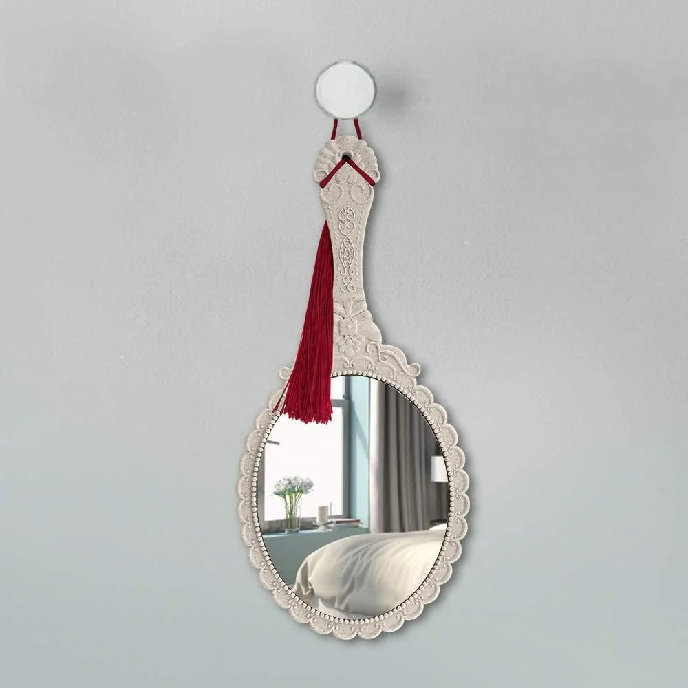 آینه دستی با دسته TERRIFI، آینه های کوچک آرایشی برای کیف دستی زنانه، آینه های جیبی کوچک برای دختران با طرح گل برجسته تزئینی (سفید عاجی) 2 عدد