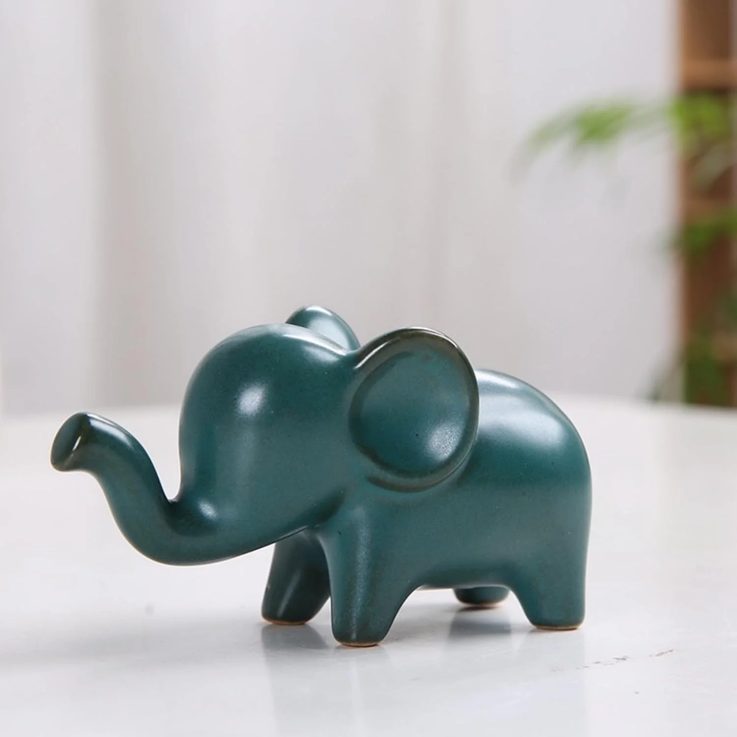مجسمه فیل سرامیکی کوچک برای دکوراسیون منزل یا محل کار، نماد ثروت و خوش شانسی، طراحی دقیق، هدیه ای برای دوستداران فیل (10x4.3x5 سانتی متر، سبز) مجسمه فیل سرامیکی کوچک برای دکوراسیون منزل یا محل کار، نماد ثروت و خوش شانسی، طراحی دقیق، هدیه ای برای دوستداران فیل (10x4.3x5 سانتی متر، سبز)