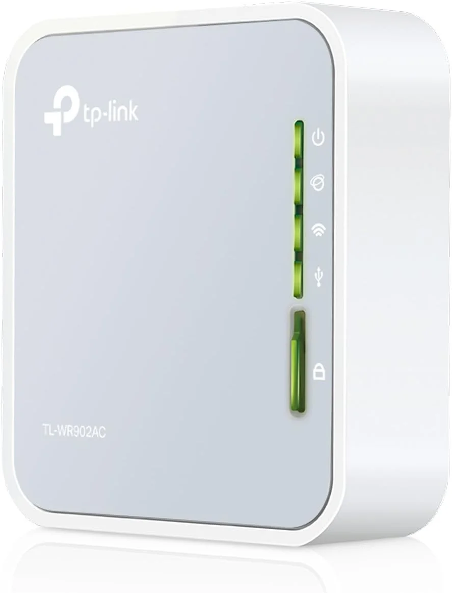 روتر مسافرتی بی سیم دو بانده TP-Link AC750 (پشتیبانی از حالت روتر/ هات اسپات/ توسعه دهنده محدوده/ حالت کلاینت/ حالت اکسس پوینت، 1 پورت USB 2.0 / 1 پورت Micro USB، 1 دکمه WPS، دوشاخه UK (TL-WR902AC)) روتر مسافرتی بی سیم دو بانده TP-Link AC750 (پشتیبانی از حالت روتر/ هات اسپات/ توسعه دهنده محدوده/ حالت کلاینت/ حالت اکسس پوینت، 1 پورت USB 2.0 / 1 پورت Micro USB، 1 دکمه WPS، دوشاخه UK (TL-WR902AC))