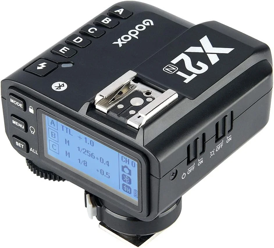فلاش تریگر بی‌سیم TTL گودکس X2T-C برای دوربین‌های کانن - برد 100 متری 2.4G، همگام‌سازی پرسرعت 1/8000 ثانیه، دارای هات شو برای اتصال فلاش، 5 گروه و 32 کانال، کنترل از طریق اپلیکیشن بلوتوث، سازگار با دوربین‌های کانن