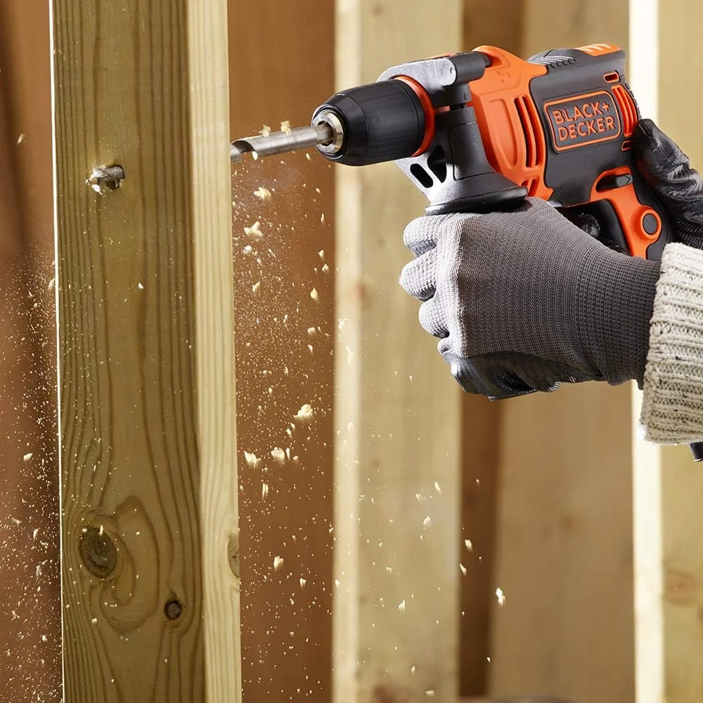 دریل چکشی تک سرعته 710 وات بلک اند دکر با سرعت 47,600 ضربه در دقیقه به همراه 4 مته در جعبه ابزار برای سوراخکاری فلز و مصالح ساختمانی، نارنجی/مشکی - BEH710K-GB دریل چکشی تک سرعته 710 وات بلک اند دکر با سرعت 47,600 ضربه در دقیقه به همراه 4 مته در جعبه ابزار برای سوراخکاری فلز و مصالح ساختمانی، نارنجی/مشکی - BEH710K-GB