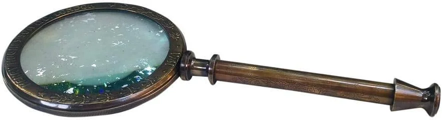 ذره بین دستی با قاب برنجی عتیقه ذره بین دستی با قاب برنجی عتیقه