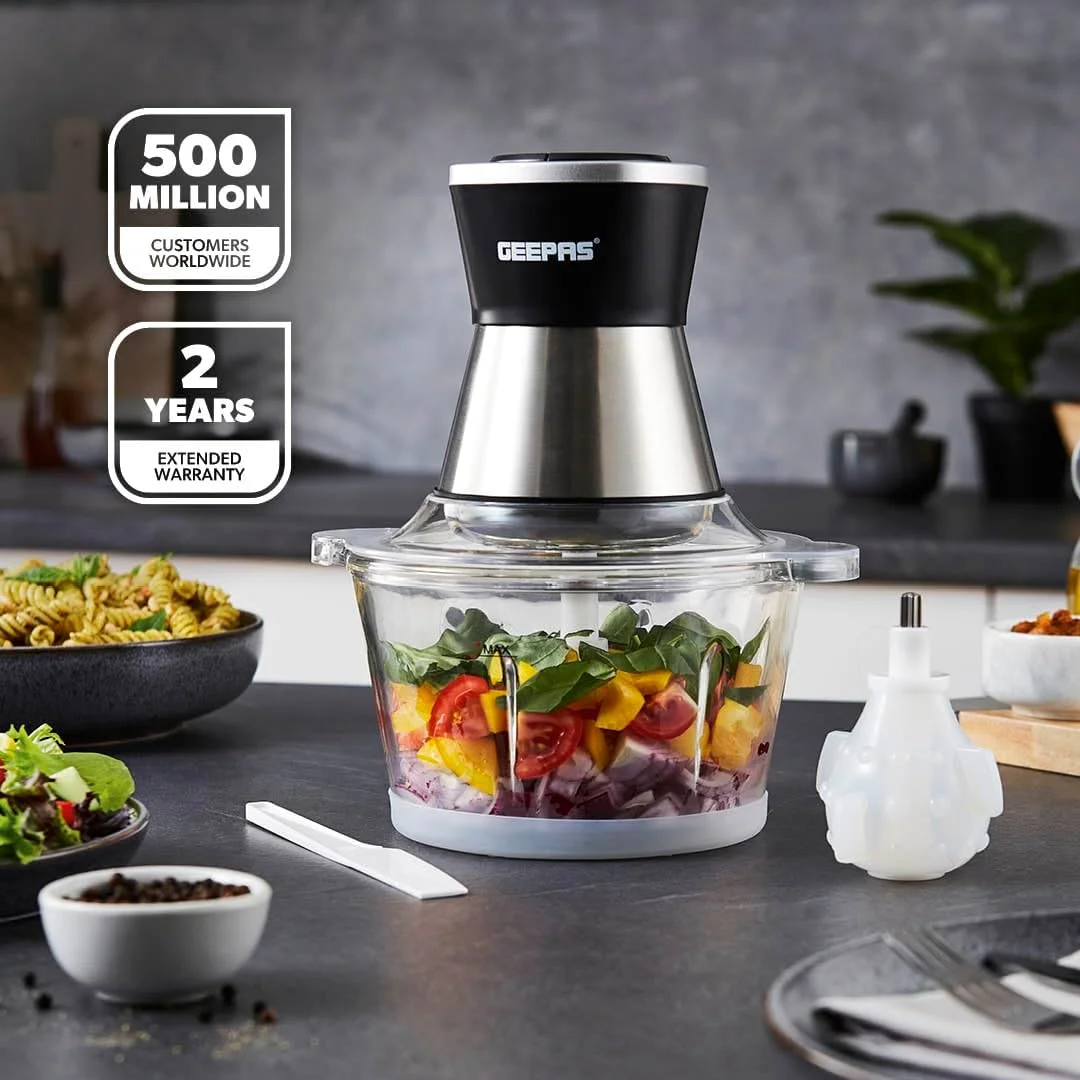 غذاساز چندکاره 2 لیتری Geepas با پوست کن سیر - 2 سرعته با 4 تیغه استیل ضد زنگ | کاسه شیشه ای | 500 وات | ایده آل برای خرد کردن سیر، زنجبیل، سبزیجات، پیاز، آجیل و موارد دیگر غذاساز چندکاره 2 لیتری Geepas با پوست کن سیر - 2 سرعته با 4 تیغه استیل ضد زنگ | کاسه شیشه ای | 500 وات | ایده آل برای خرد کردن سیر، زنجبیل، سبزیجات، پیاز، آجیل و موارد دیگر