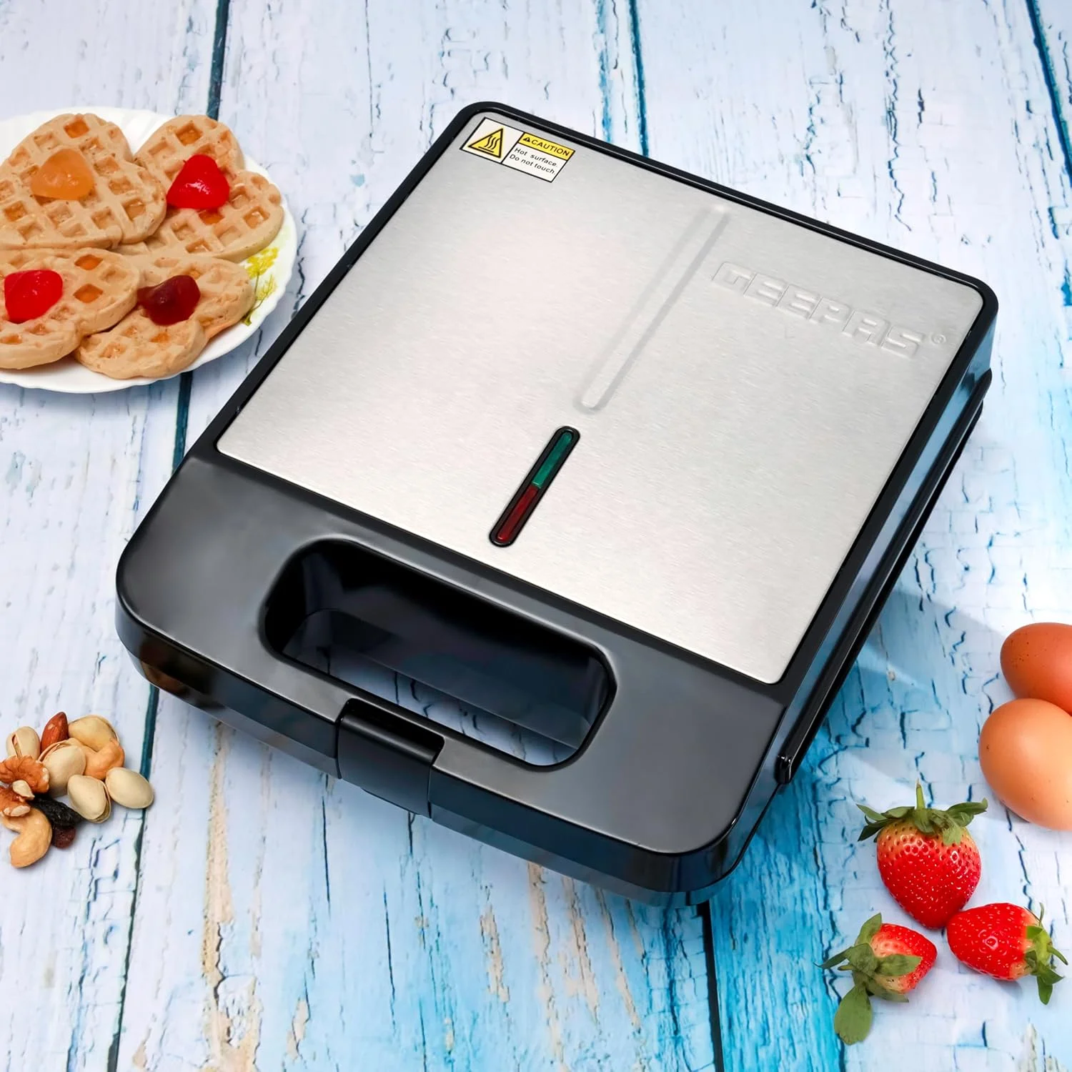 دستگاه وافل ساز قلبی Geepas، ظرفیت 4 تکه، صفحه پخت نچسب Gwm36543، دسته خنک و پایه های ضد لغزش، محافظت در برابر گرمای بیش از حد، چراغ های نشانگر روشن/آماده، مشکی دستگاه وافل ساز قلبی Geepas، ظرفیت 4 تکه، صفحه پخت نچسب Gwm36543، دسته خنک و پایه های ضد لغزش، محافظت در برابر گرمای بیش از حد، چراغ های نشانگر روشن/آماده، مشکی