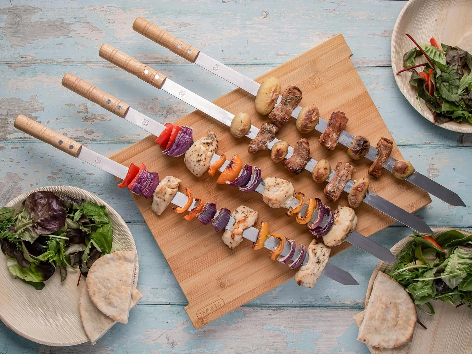 ۶ عدد سیخ کباب ترکی آدانا با دسته چوبی. سیخ های کباب پز استیل تخت پهن به طول ۵۷.۵ سانتی متر، عرض ۲ سانتی متر و ضخامت ۲ میلی متر. ۶ عدد سیخ کباب ترکی آدانا با دسته چوبی. سیخ های کباب پز استیل تخت پهن به طول ۵۷.۵ سانتی متر، عرض ۲ سانتی متر و ضخامت ۲ میلی متر.