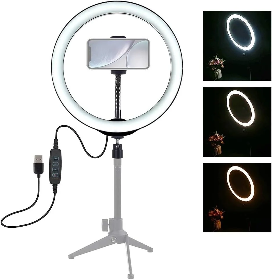 نور حلقه ای LED با قطر 26 سانتی متر، دارای 3 حالت نور و قابلیت تنظیم روشنایی، مناسب برای ولاگ، سلفی و عکاسی و فیلمبرداری، به همراه سه پایه توپی و گیره نگهدارنده گوشی (مشکی) نور حلقه ای LED با قطر 26 سانتی متر، دارای 3 حالت نور و قابلیت تنظیم روشنایی، مناسب برای ولاگ، سلفی و عکاسی و فیلمبرداری، به همراه سه پایه توپی و گیره نگهدارنده گوشی (مشکی)