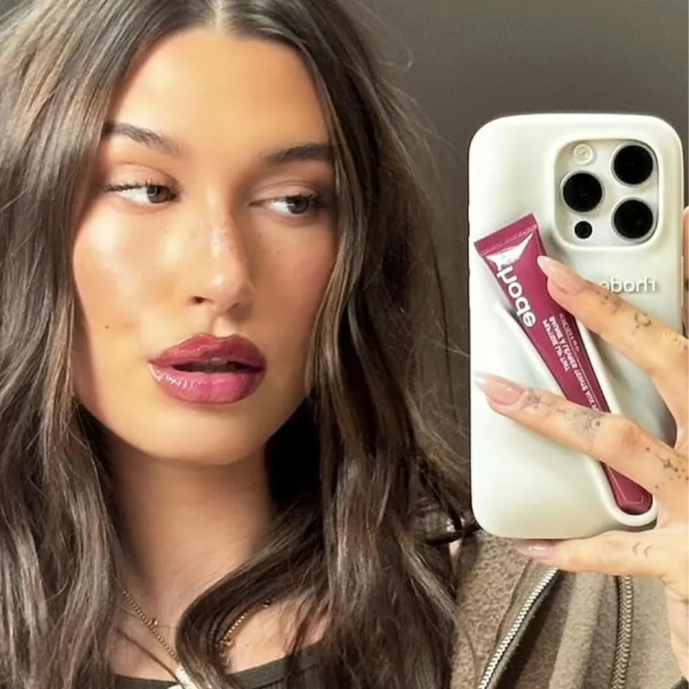 محفظه رژ لب Rhode - لوازم جانبی شیک سیلیکونی تلفن برای مراقبت از لب پپتیدی، گیره بادوام و طراحی شیک - مناسب برای مدل های منتخب آیفون (ژله تمشک، بنفش، آیفون 14 پرو مکس)